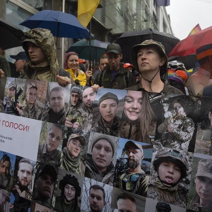 LGBTQ soldiers in Ukraine hope their service is changing attitudes as they rally for legal rights